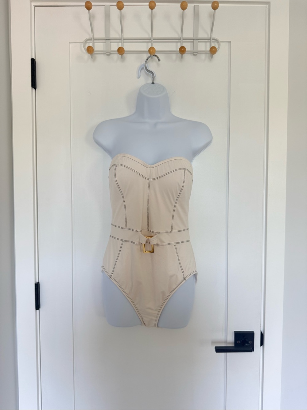 Strapless Ivory One-Piece Swimsuit with Gold Buckle